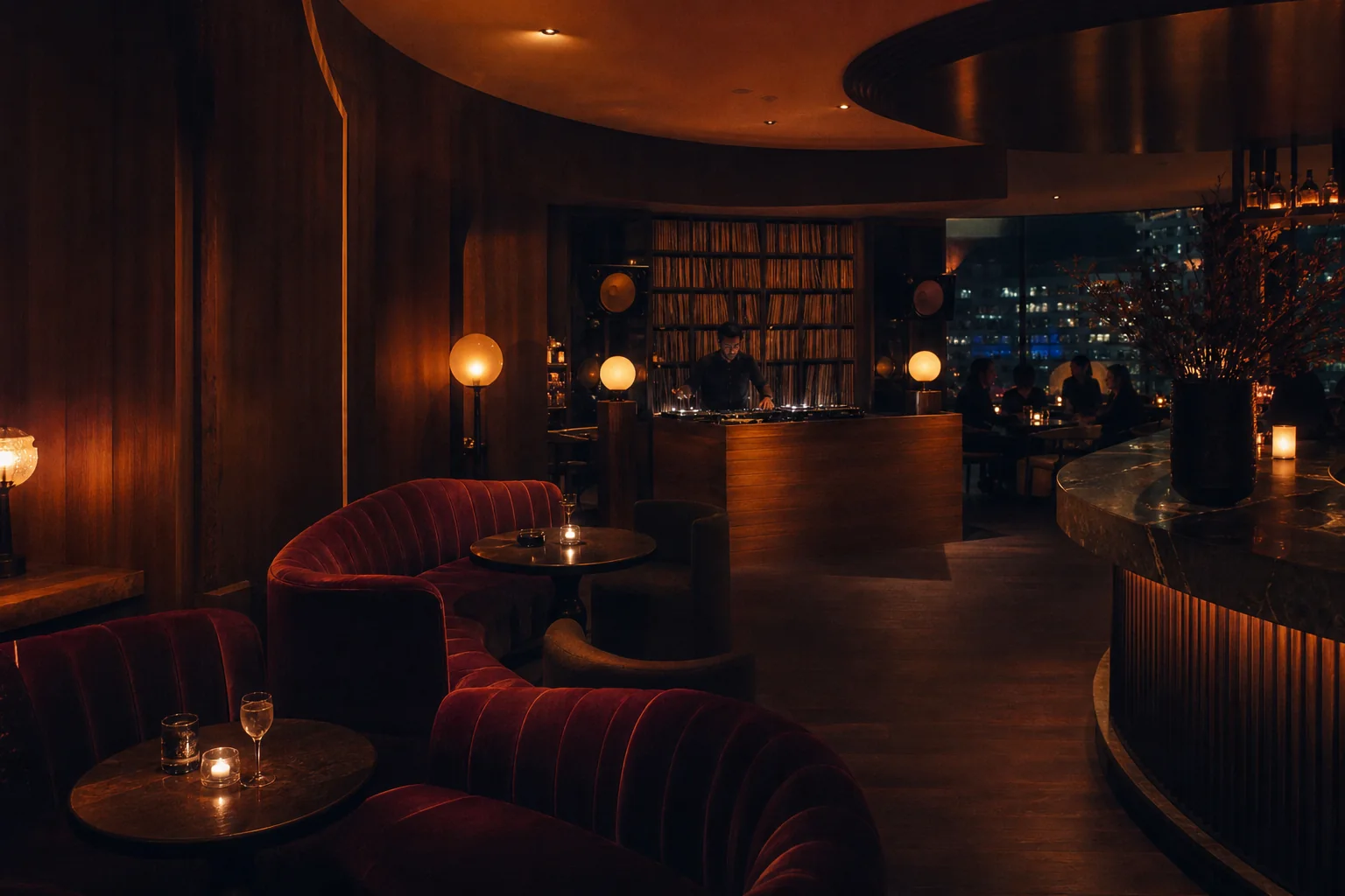 Oxblood listening lounge with a vinyl DJ booth
